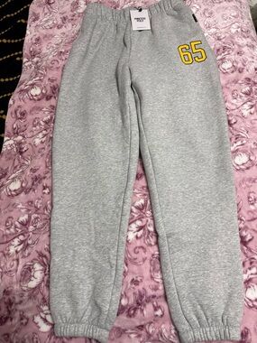 Princess Polly Grey UC IRVINE Joggers with Yellow '65' Graphic